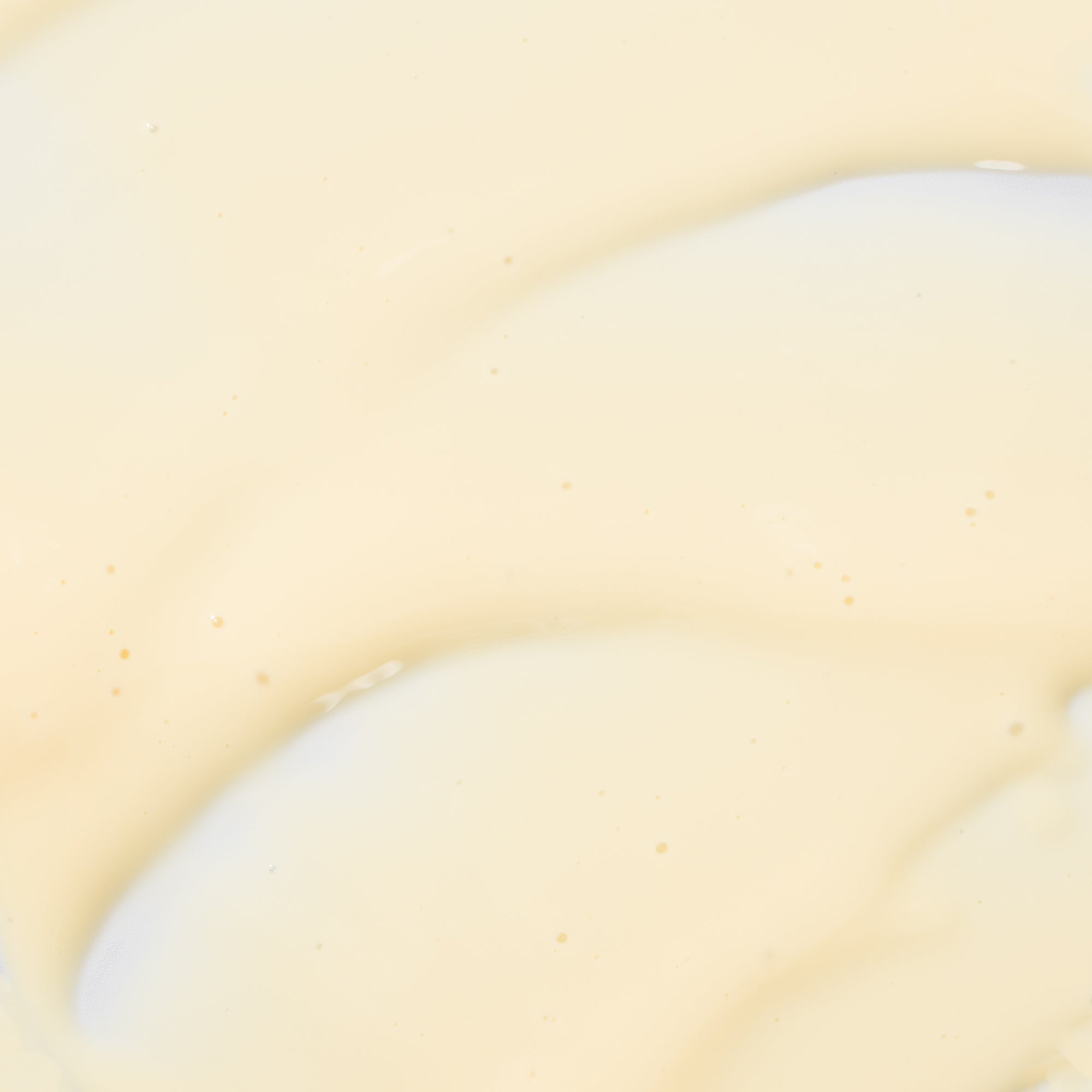 Light yellow cream of A-Lift Overnight Vitamin A Body Treatment PM against white background 