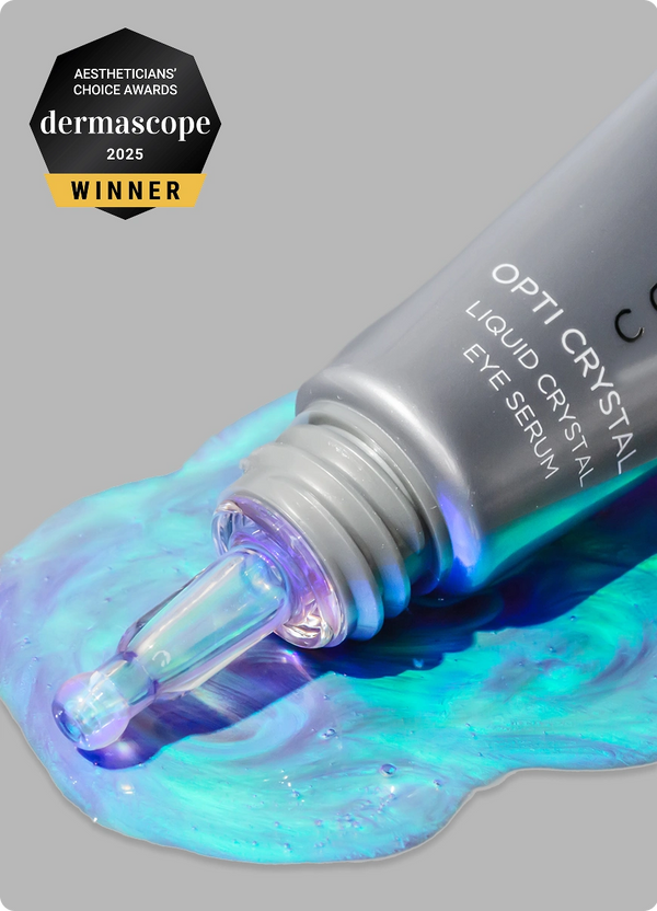 Close Up of Opti Crystal with 2025 Derma scope Award Winner against gray background