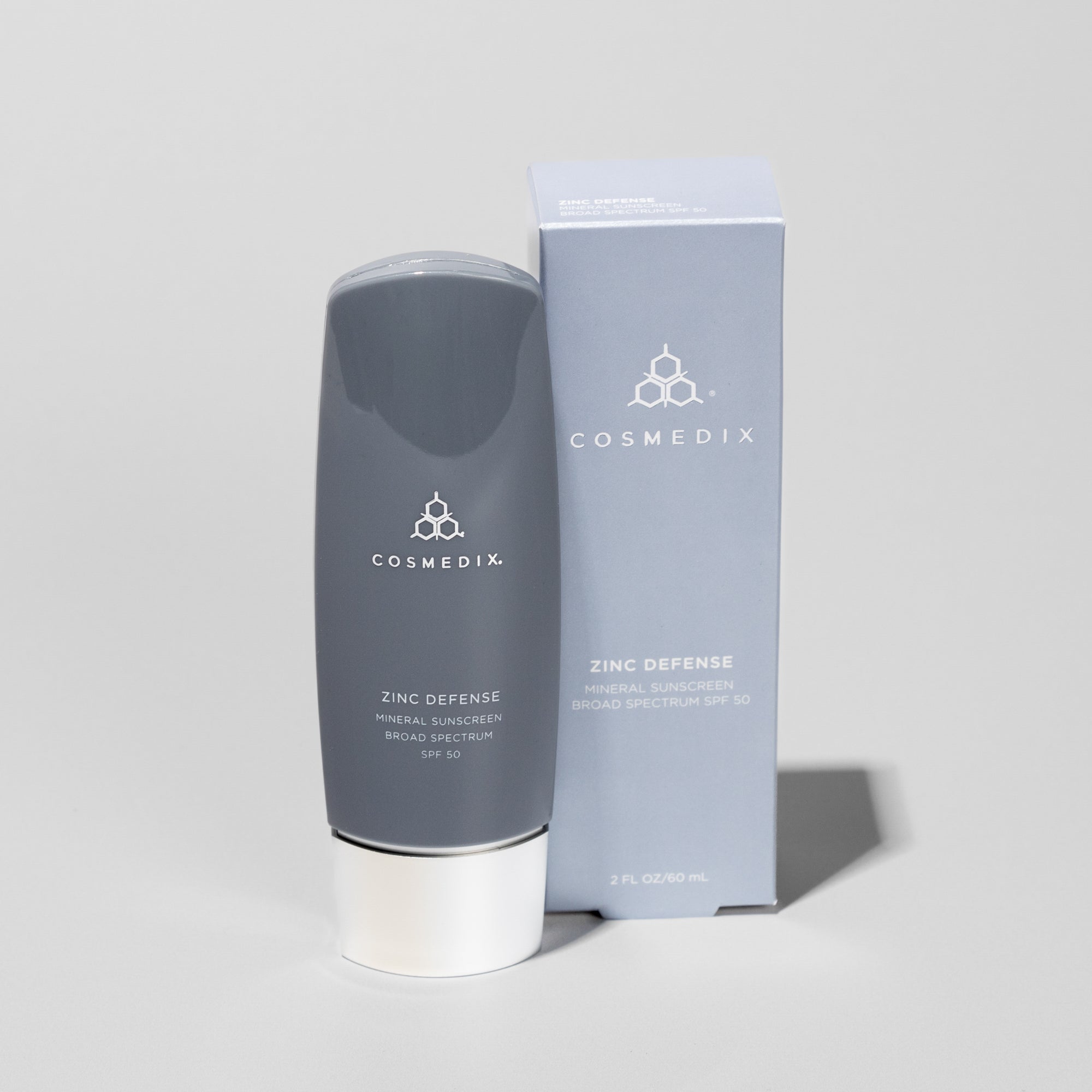 Skin Barrier Trio packaging with blue gray box and matching bottle COSMEDIX branding